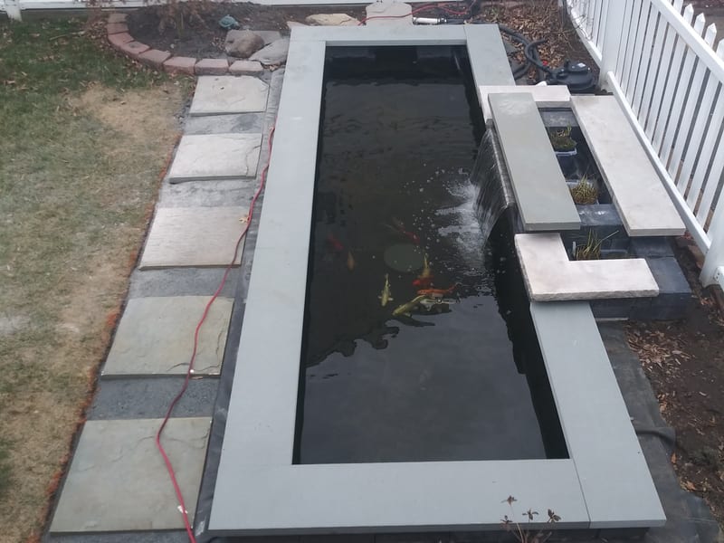 Natural stone and boulder landscape installation